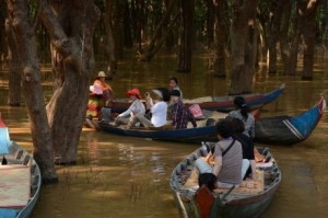 Tourists visiting Kampong Phluk floating community in Siem Reap province in Northern part of Cambodia.